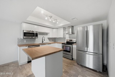 Welcome home to this beautifully updated 2-bedroom, 1-bathroom - photo 1