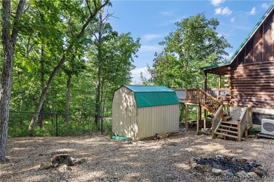 Escape to this adorable 2-bed, 2-bath rustic log cabin tucked - photo 27