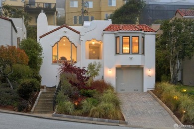 This outstanding Spanish Mediterranean home is a showplace of - photo 1