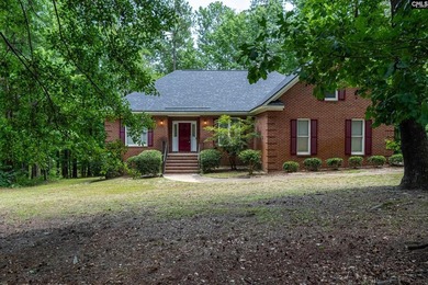Welcome to this custom-built, all-brick home nestled on 1.55 - photo 2