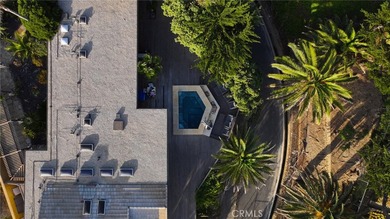 Poised at the end of a private, ocean front cul de sac in the - photo 2