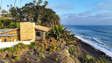 Poised at the end of a private, ocean front cul de sac in the - photo 3