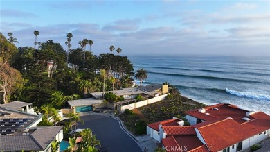 Poised at the end of a private, ocean front cul de sac in the - photo 4