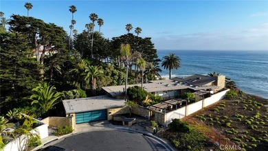 Poised at the end of a private, ocean front cul de sac in the - photo 6