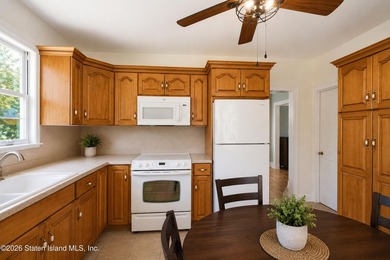 Welcome to 73 Walnut Street! Step into the inviting sunroom, a - photo 11