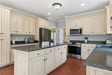 This expansive residence commands a desirable corner lot within - photo 13