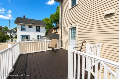 Welcome to 73 Walnut Street! Step into the inviting sunroom, a - photo 31
