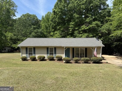 Welcome home to this charming, single-level ranch in The - photo 1
