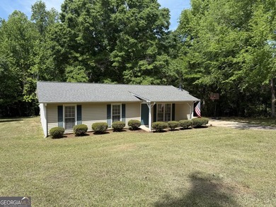 Welcome home to this charming, single-level ranch in The - photo 3