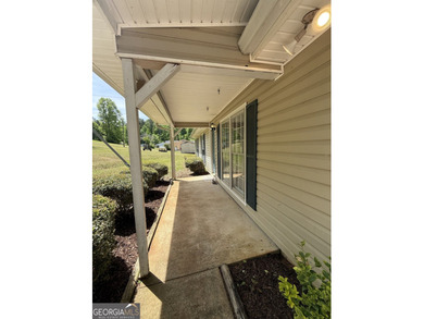 Welcome home to this charming, single-level ranch in The - photo 5
