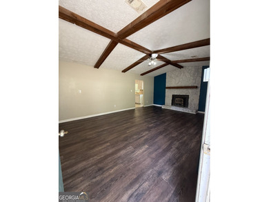 Welcome home to this charming, single-level ranch in The - photo 10