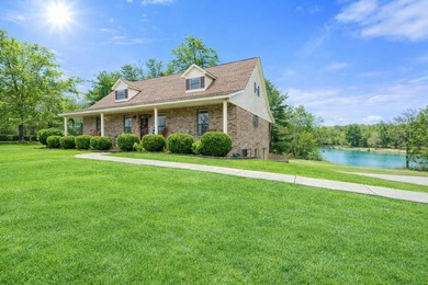 Situated on 4.06 acres in Bryant, Alabama, this Cape Cod-style - photo 1