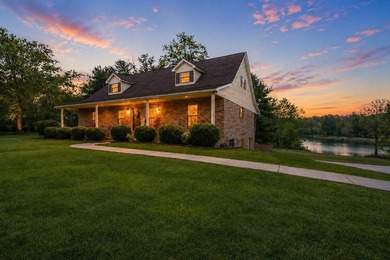 Situated on 4.06 acres in Bryant, Alabama, this Cape Cod-style - photo 2