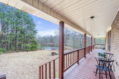 Situated on 4.06 acres in Bryant, Alabama, this Cape Cod-style - photo 5