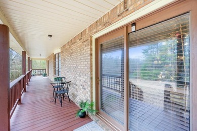 Situated on 4.06 acres in Bryant, Alabama, this Cape Cod-style - photo 6