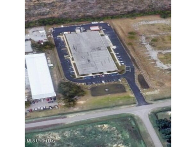 Building is leased to a tenant. Lot next door to South is - photo 1