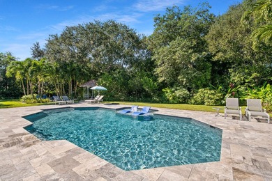 Welcome to this breathtaking 5-bedroom, 3.5-bath estate in the - photo 5