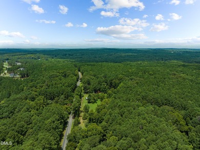 Welcome to 5.19 acres of natural beauty just one mile from Vista