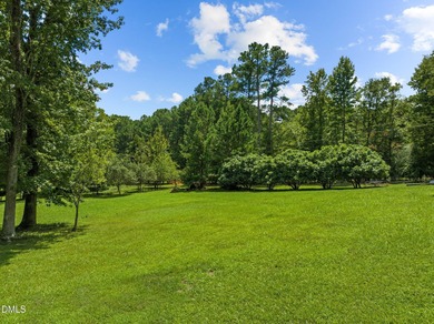 Welcome to 5.19 acres of natural beauty just one mile from Vista