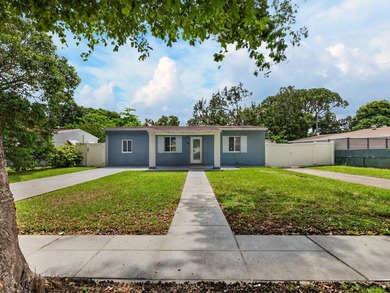 Charming and beautifully updated 3-bedroom, 2-bath residence - photo 1