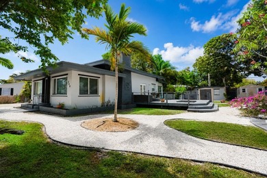 This fully occupied multi-family gem in Dania Beach features a - photo 1