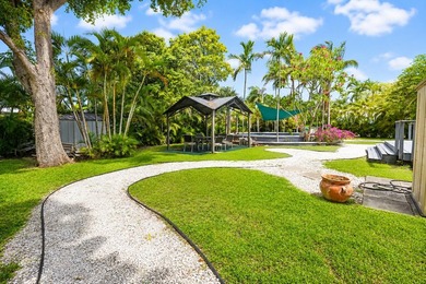 This fully occupied multi-family gem in Dania Beach features a - photo 5