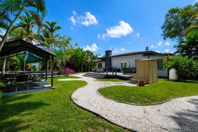 This fully occupied multi-family gem in Dania Beach features a - photo 8