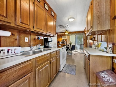 This lake home has it all for 1 price - Boat, 2 PWC's, Paddle - photo 16