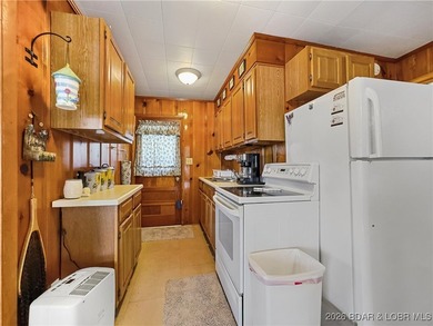 This lake home has it all for 1 price - Boat, 2 PWC's, Paddle - photo 17