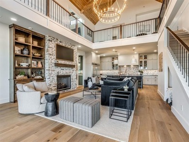 Completed in 2025, this exceptional custom lake home in the - photo 4