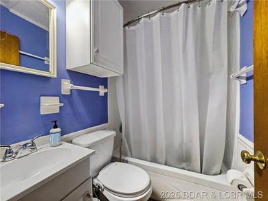 This lake home has it all for 1 price - Boat, 2 PWC's, Paddle - photo 25
