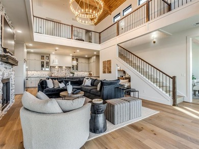 Completed in 2025, this exceptional custom lake home in the - photo 5