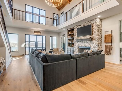 Completed in 2025, this exceptional custom lake home in the - photo 6