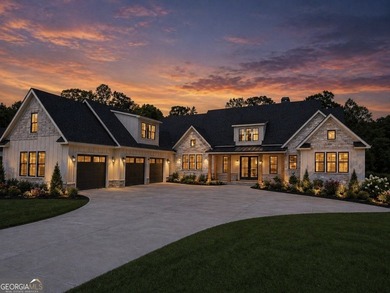 EXPERIENCE THE BEAUTY OF LAKEFRONT LIVING IN THIS SPECTACULAR - photo 2