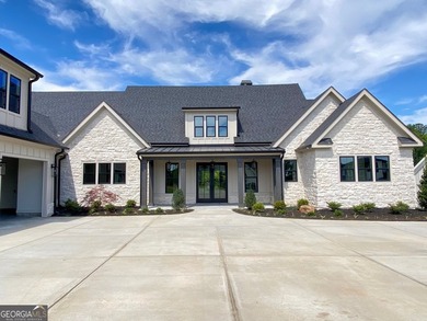 EXPERIENCE THE BEAUTY OF LAKEFRONT LIVING IN THIS SPECTACULAR - photo 3