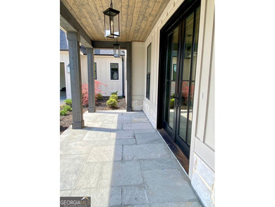 EXPERIENCE THE BEAUTY OF LAKEFRONT LIVING IN THIS SPECTACULAR - photo 4