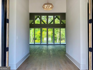 EXPERIENCE THE BEAUTY OF LAKEFRONT LIVING IN THIS SPECTACULAR - photo 5