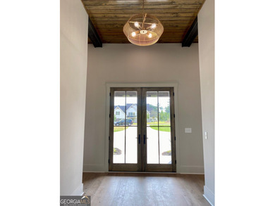 EXPERIENCE THE BEAUTY OF LAKEFRONT LIVING IN THIS SPECTACULAR - photo 6