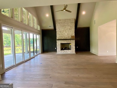EXPERIENCE THE BEAUTY OF LAKEFRONT LIVING IN THIS SPECTACULAR - photo 8