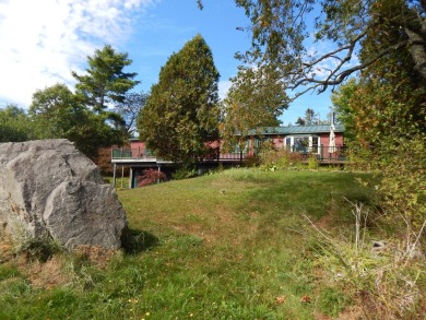 Nestled at the back of a beautifully landscaped 2 acre lot, this