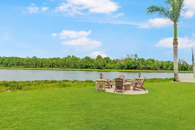 Luxury lakefront living awaits in Magnolia Lakes! This - photo 3