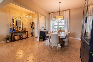 Luxury lakefront living awaits in Magnolia Lakes! This - photo 4