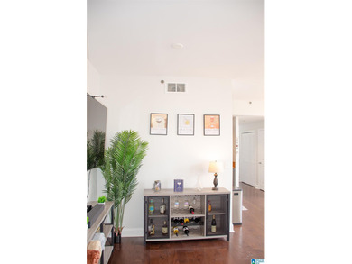 What a fabulous condo in the middle of the Loft District.  Walk