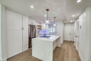 Experience curated luxury living in this sun-filled, completely - photo 4