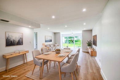 Experience curated luxury living in this sun-filled, completely - photo 9