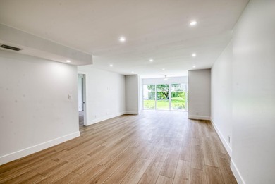 Experience curated luxury living in this sun-filled, completely - photo 10