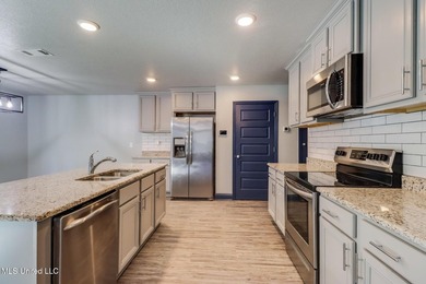 Welcome to this well-maintained four-bedroom home, centrally - photo 6