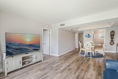 WELCOME TO YOUR SPACIOUS,SPARKLING UPDATED CONDO OVERLOOKING THE - photo 3