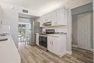 WELCOME TO YOUR SPACIOUS,SPARKLING UPDATED CONDO OVERLOOKING THE - photo 7