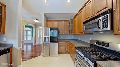 Discover refined coastal living in this beautifully maintained - photo 13